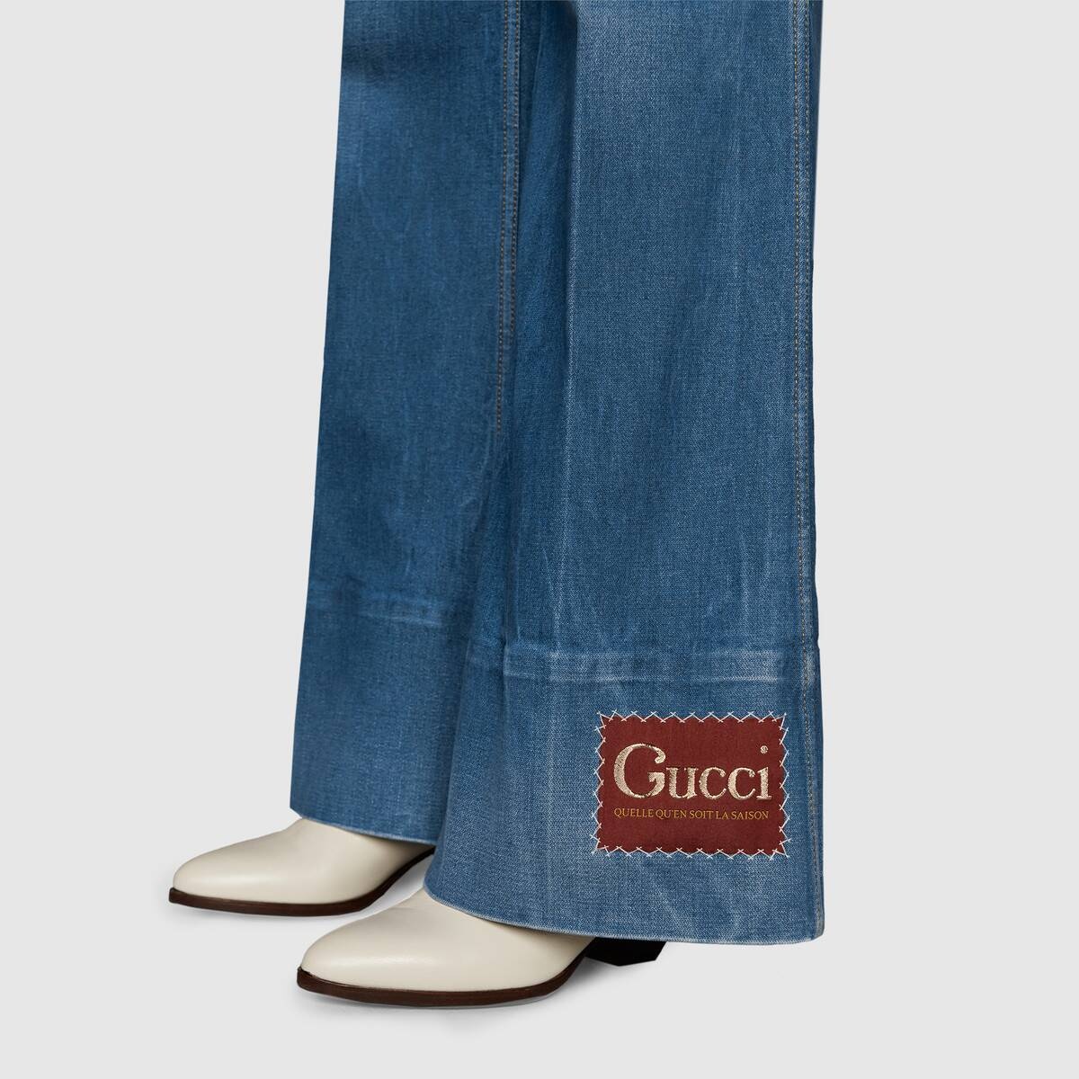 Washed denim flare pant with Gucci label - 9