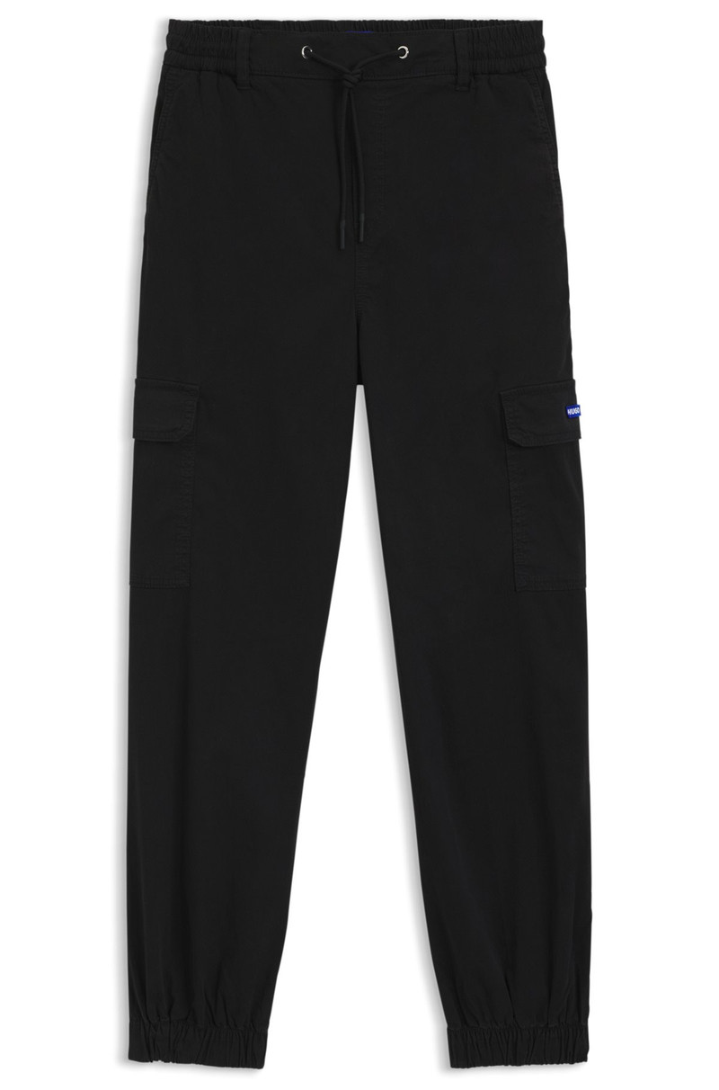 재봉된 거리 COTTON에 있는 RELAXED-FIT 바지 1