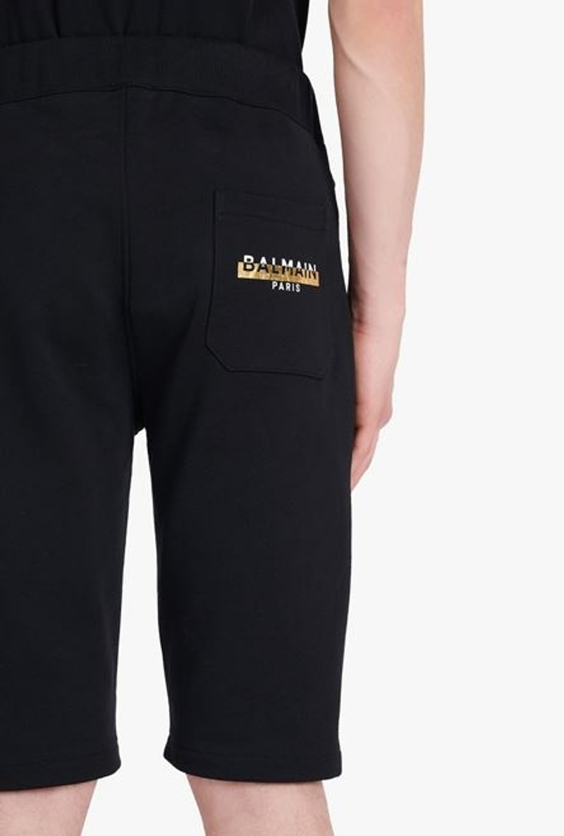 Black eco-designed cotton shorts with white and gold Balmain Paris logo print 8