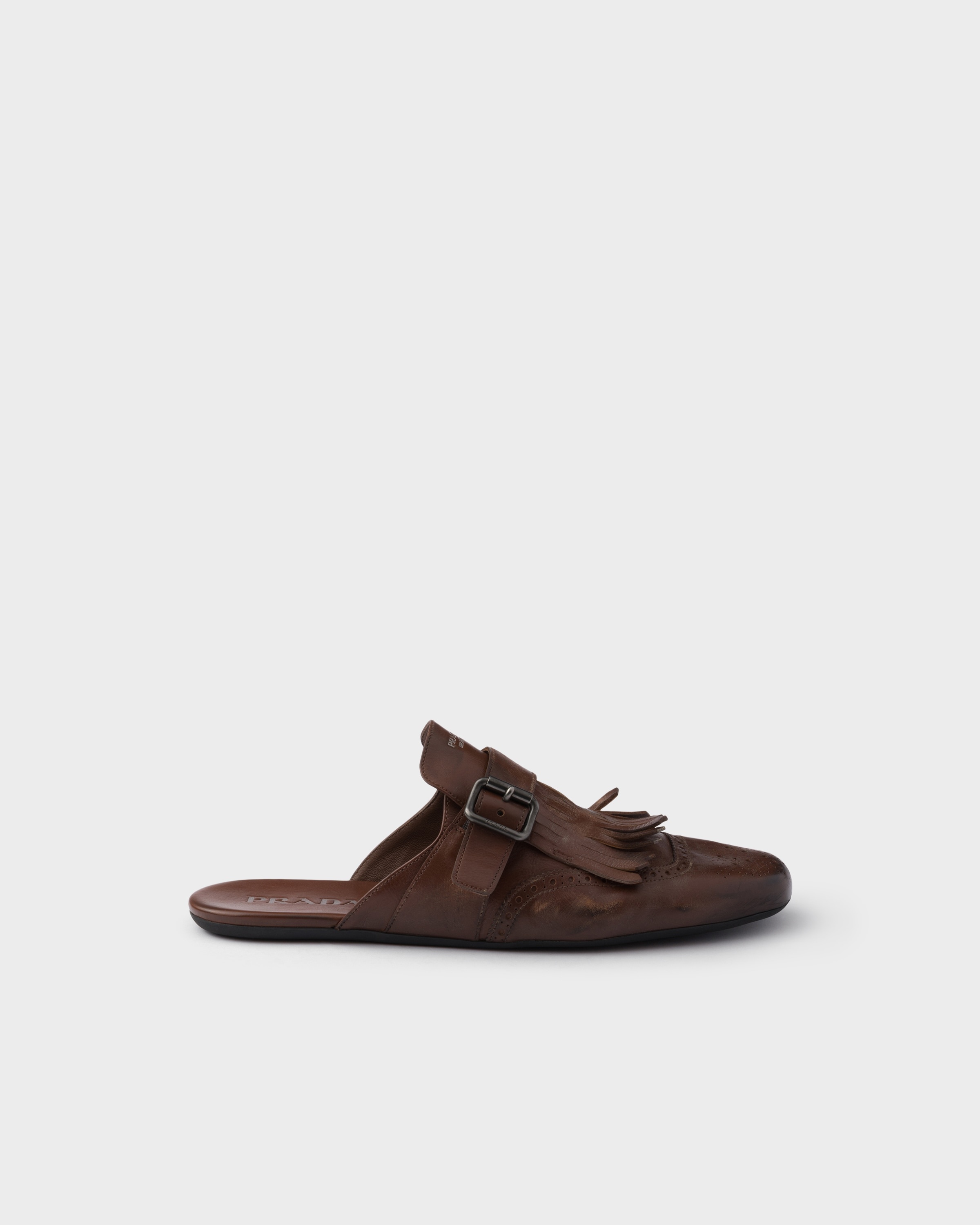 Shuffle antiqued leather mules with buckled strap and fringe - 2