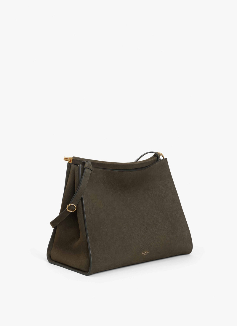 Alaïa LE CLICK MEDIUM SQUARE BAG IN NUBUCK outlook