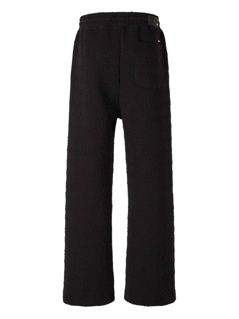 AMIRI elasticated waist trousers outlook