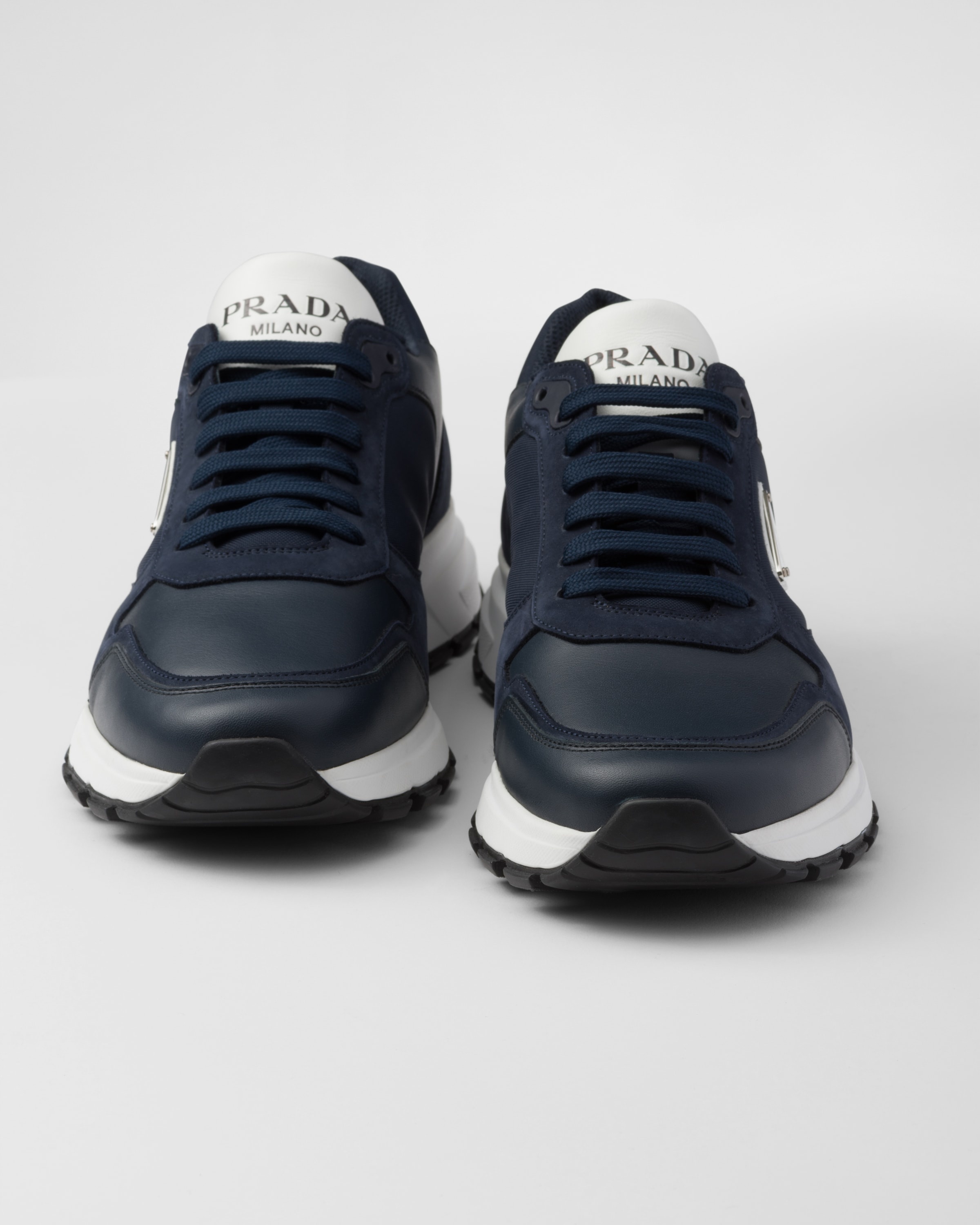 Prada Nubuck and Re-Nylon high-top sneakers | REVERSIBLE