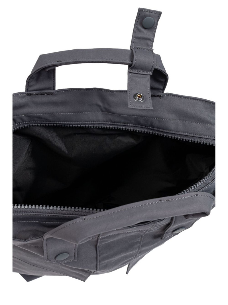 flap-pocketed bagpack 5