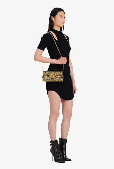 Balmain Bicolor gold and black leather B-Buzz clutch bag outlook