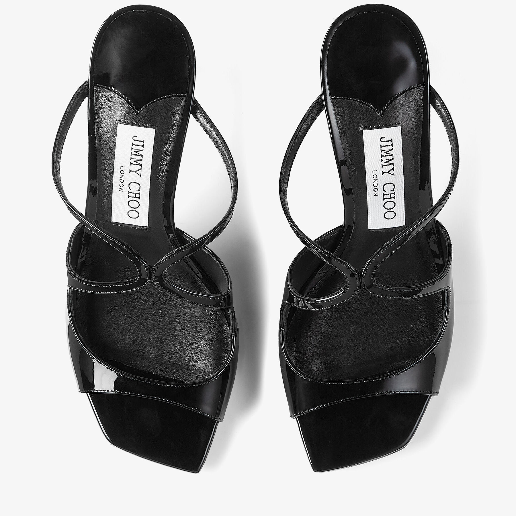 Anise 75
Black Patent Leather Mules - 4