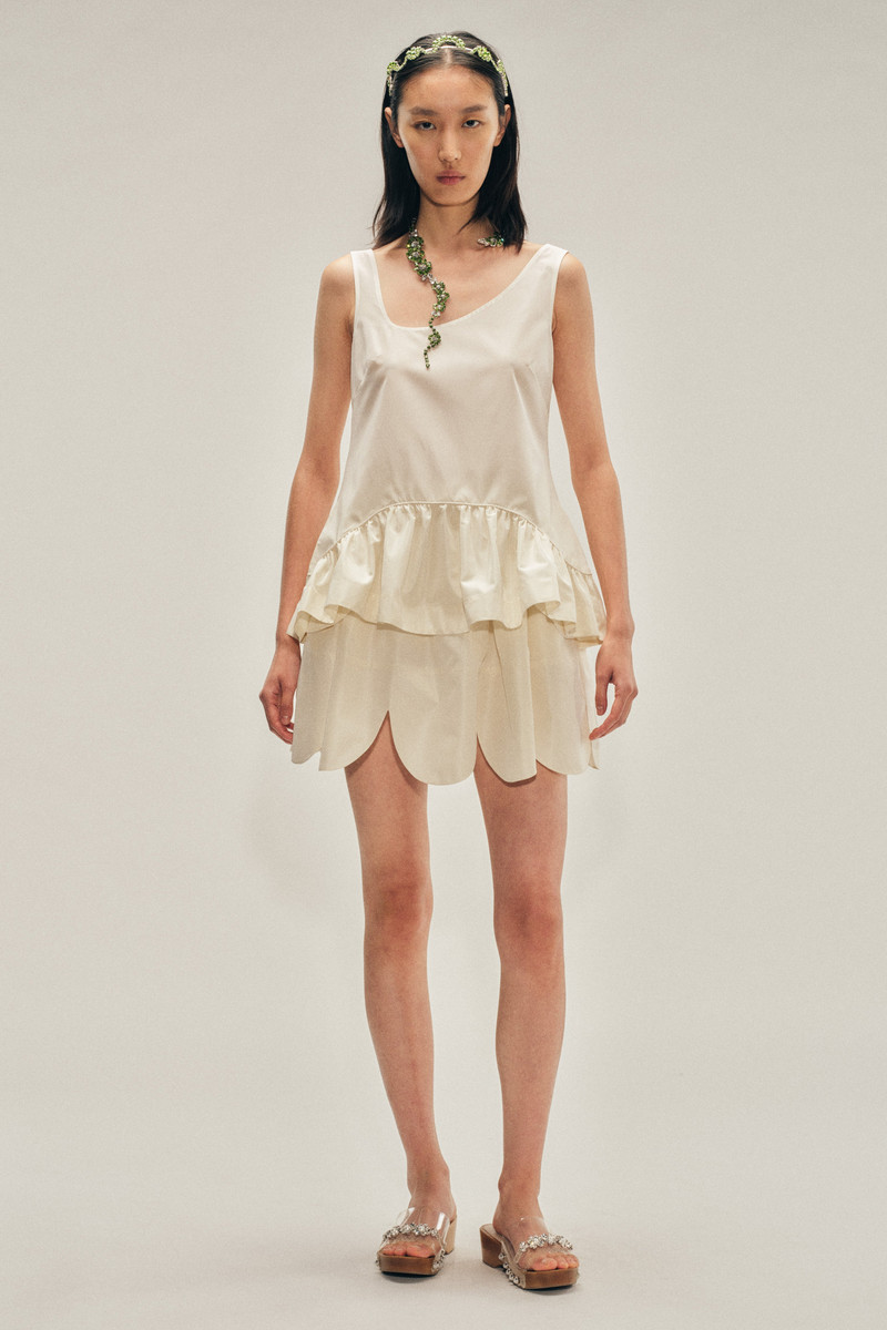 Tilted Neck Peplum Top 1