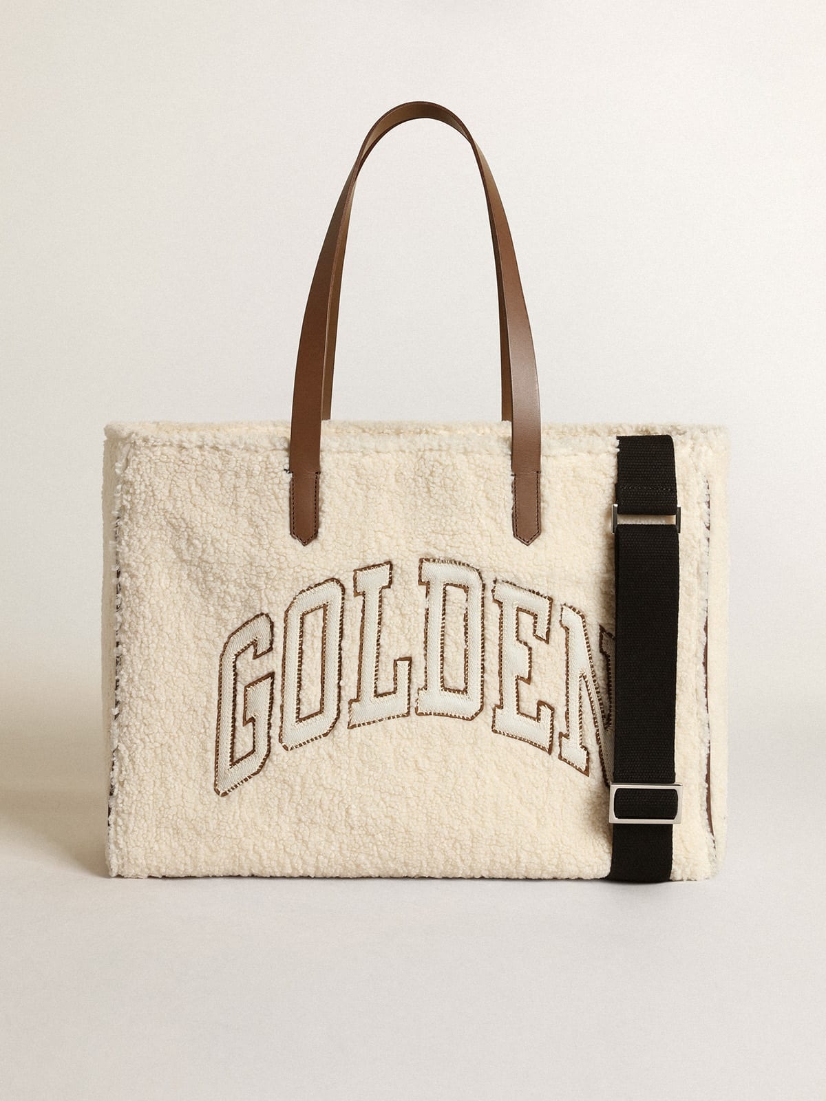 East-West California Bag in white faux fur with Golden lettering and contrasting handles - 2