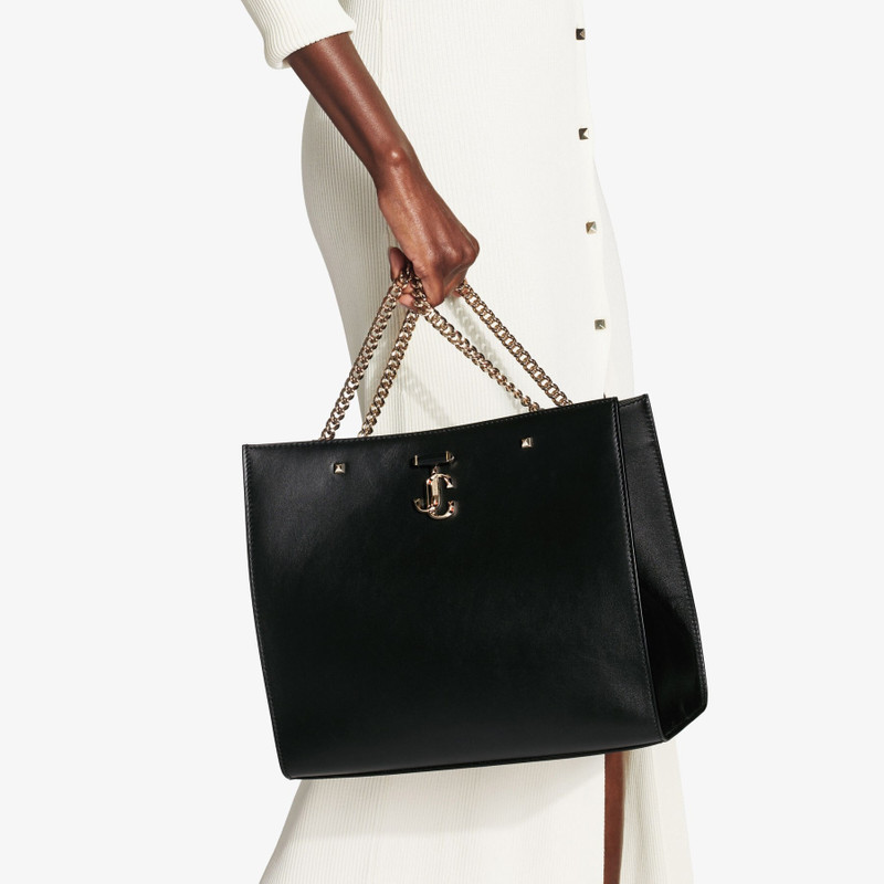 Varenne Tote Bag
Black Fine Shiny Calf Leather Tote Bag with Light Gold JC Emblem 3