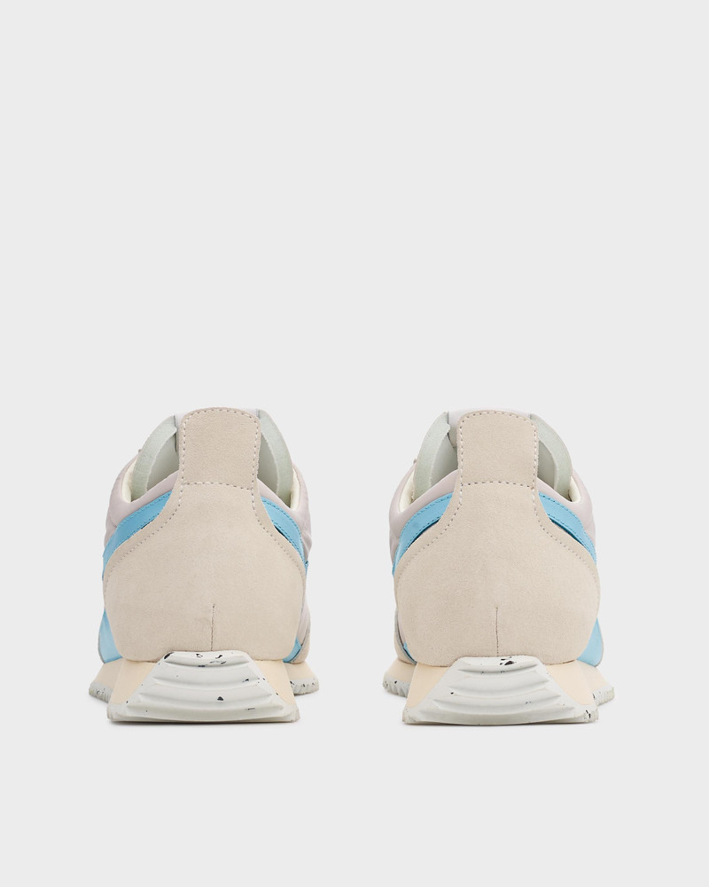 Retro Runner
Leather and Recycled Material Sneaker 4