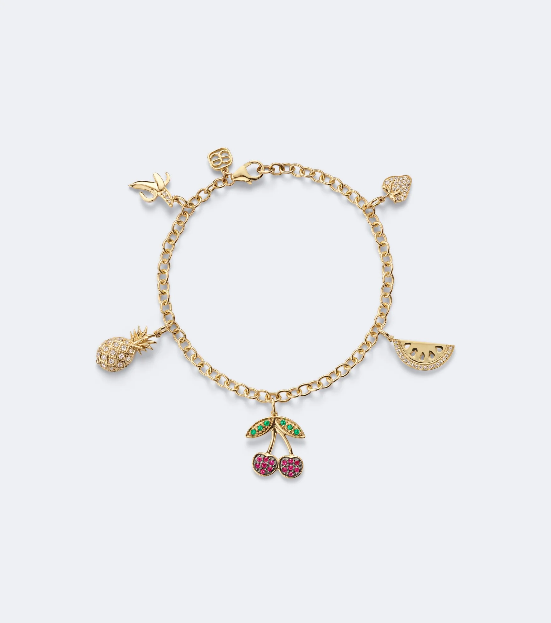 14kt gold charm bracelet with gemstones - 1