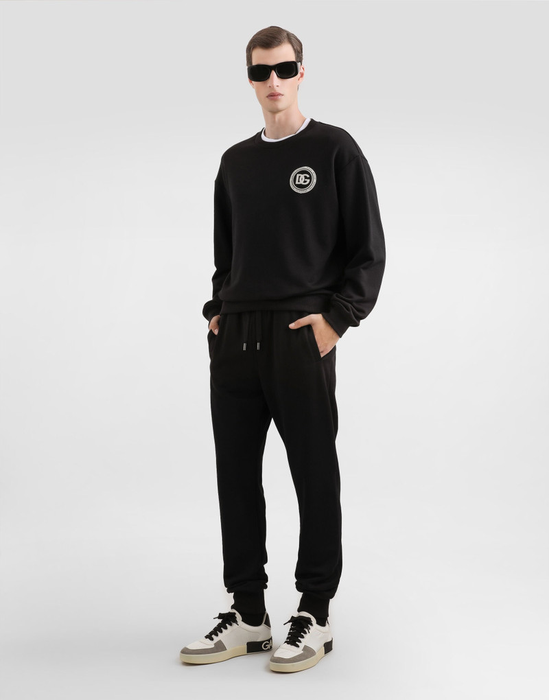 Dolce & Gabbana Jersey trousers with patch outlook
