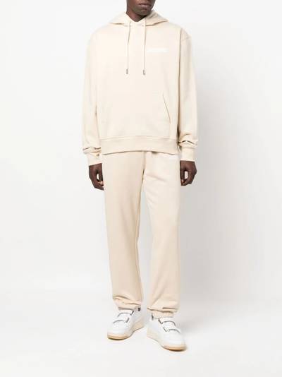 JACQUEMUS logo-print organic cotton track pants outlook