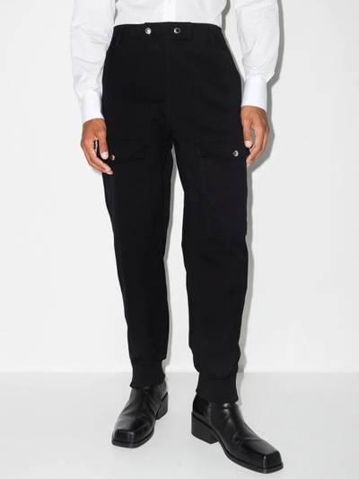 Alexander McQueen cargo track pants outlook