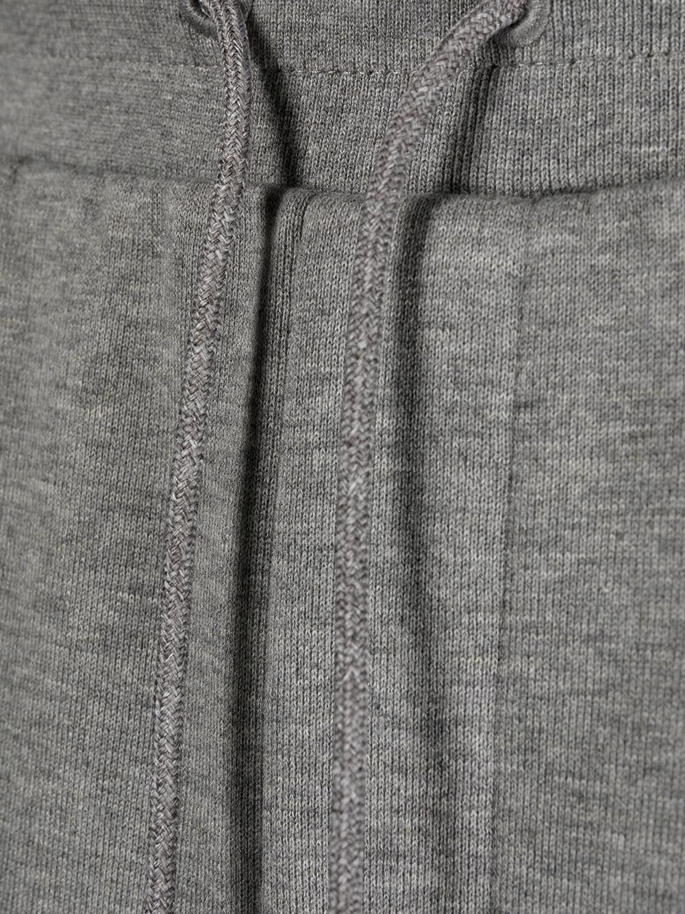 logo-embossed track pants - 7