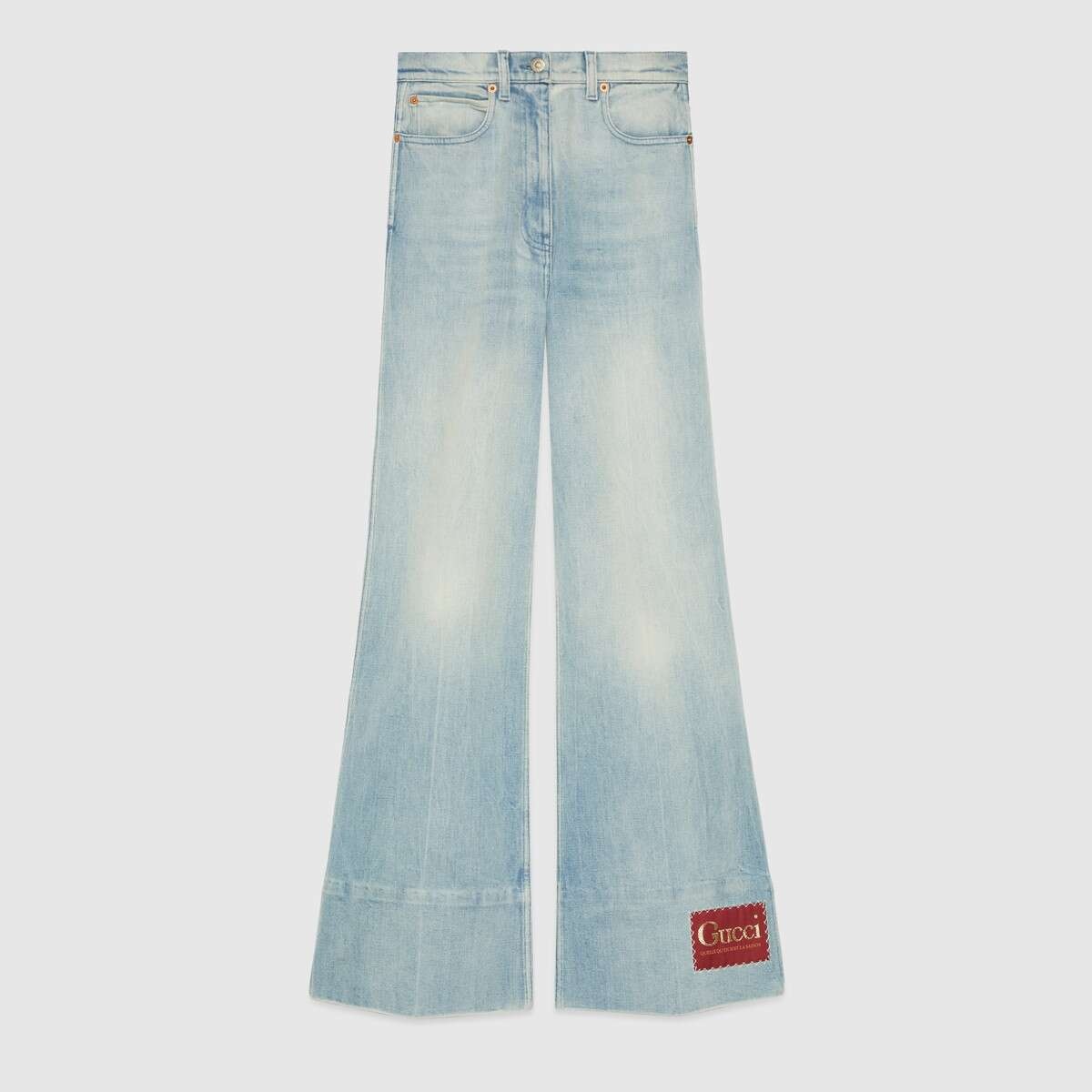 Washed denim flare pant with Gucci label - 1