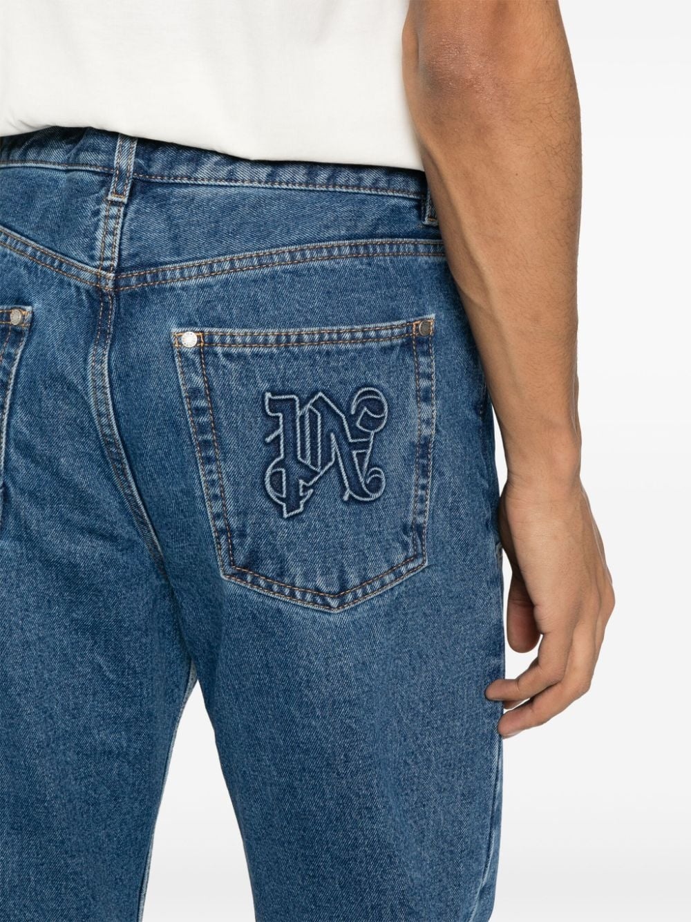 logo-embossed straight-leg jeans - 5