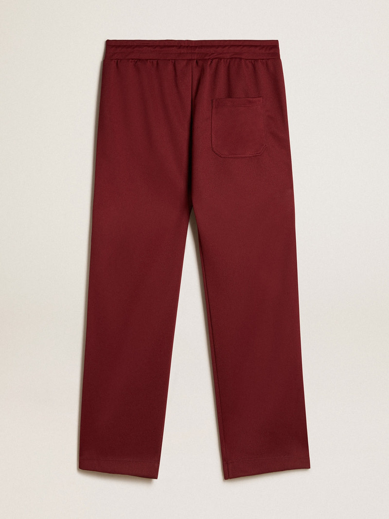 Men’s burgundy joggers with stars on the sides 6