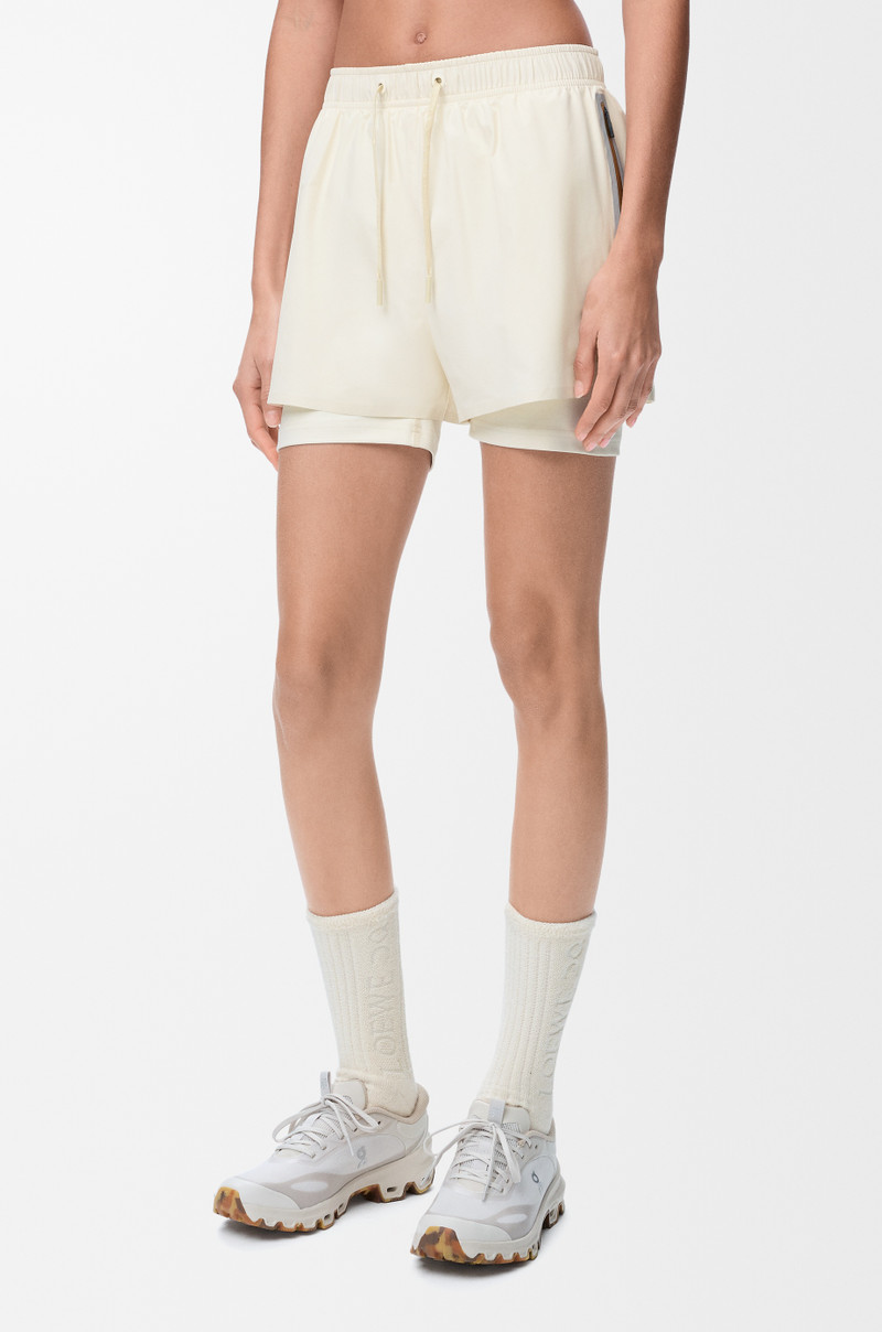 Performance shorts in technical shell 3