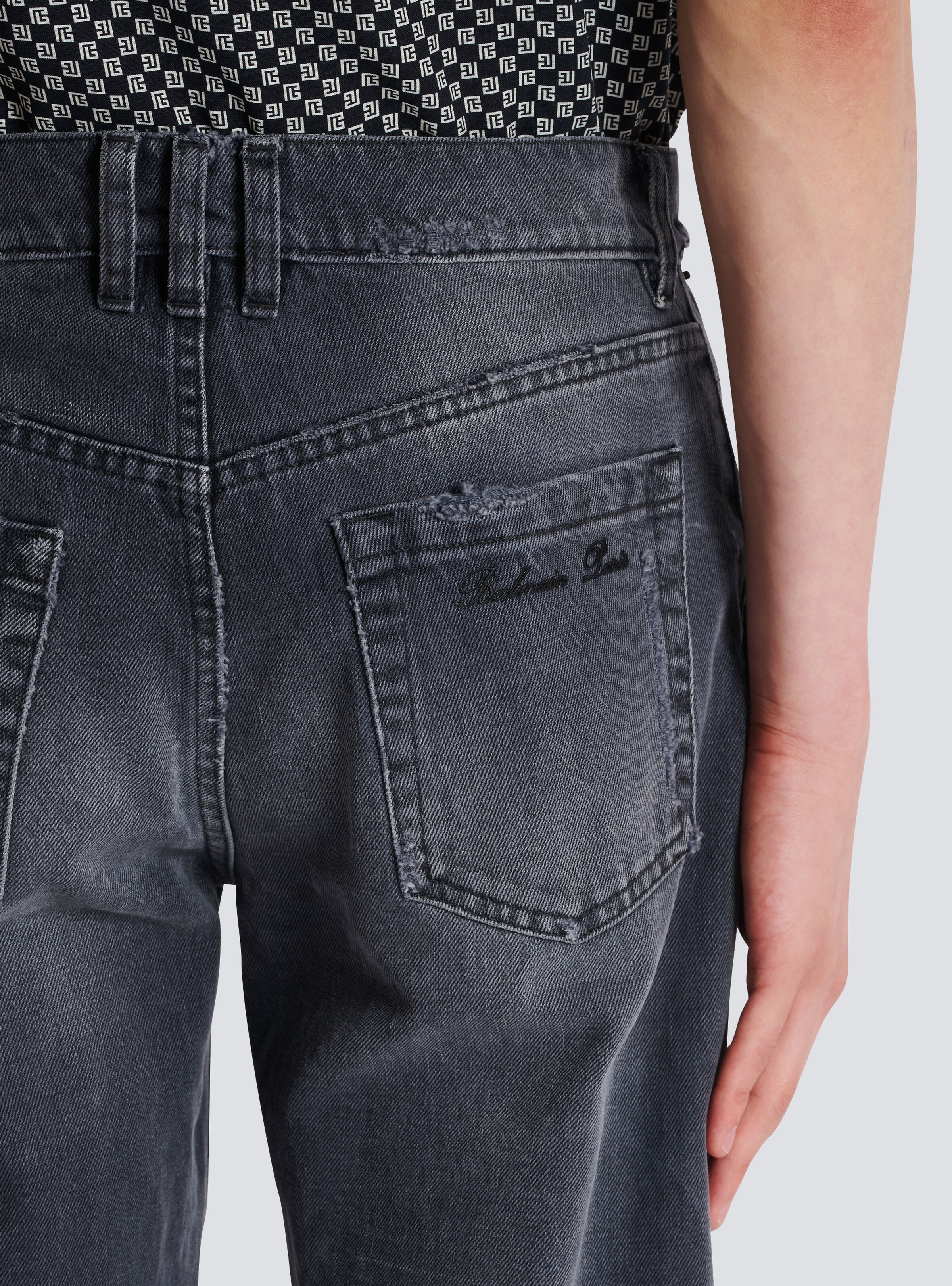 Faded denim patchwork jeans - 7