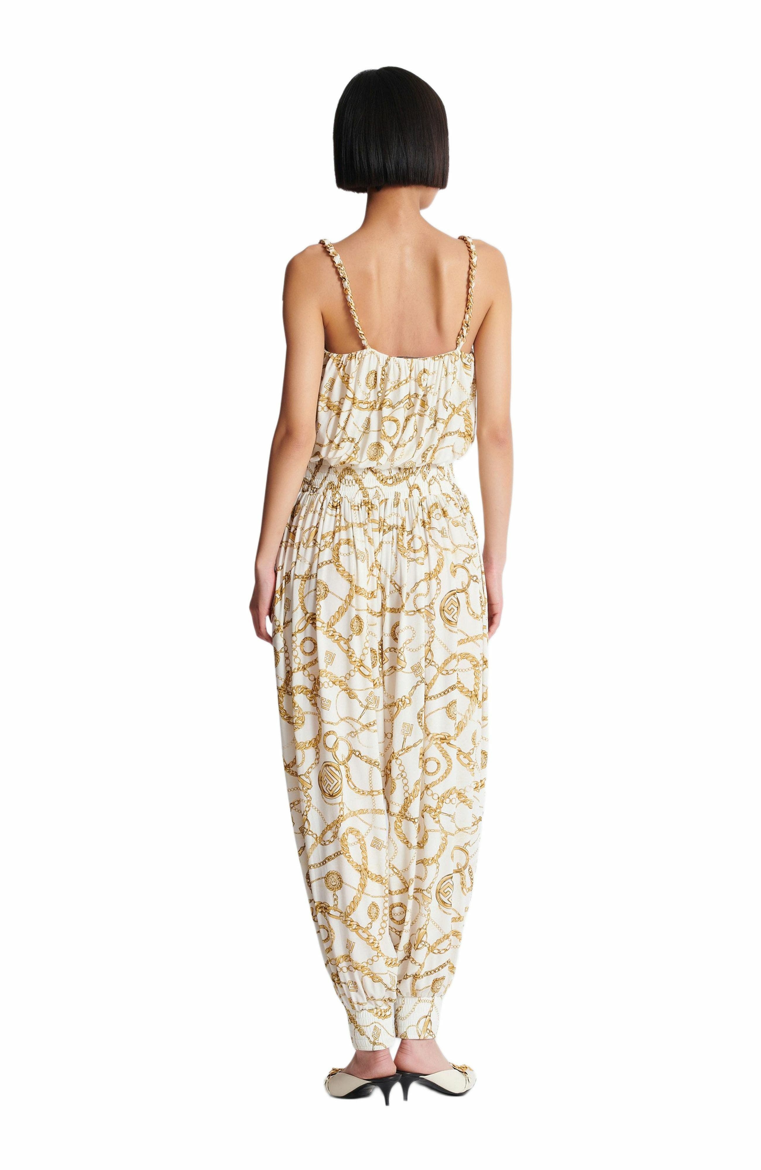 Flowing printed jumpsuit with Balmain Chains pattern in Gold at Nordstrom - 3