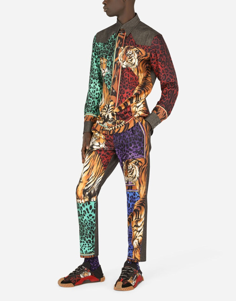 Oversize black denim and twill jeans with tiger print 6