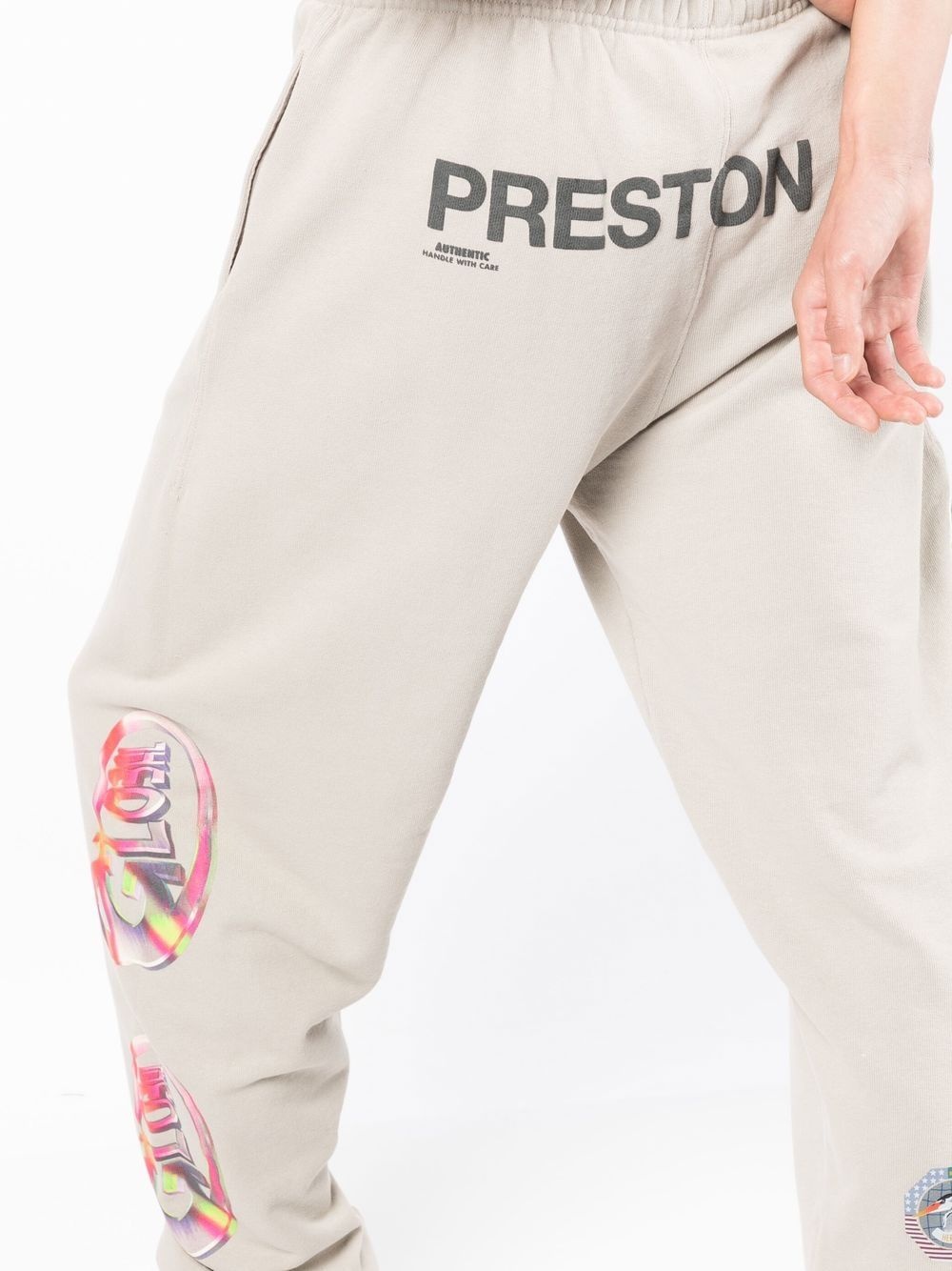 Global-print cotton track pants - 5