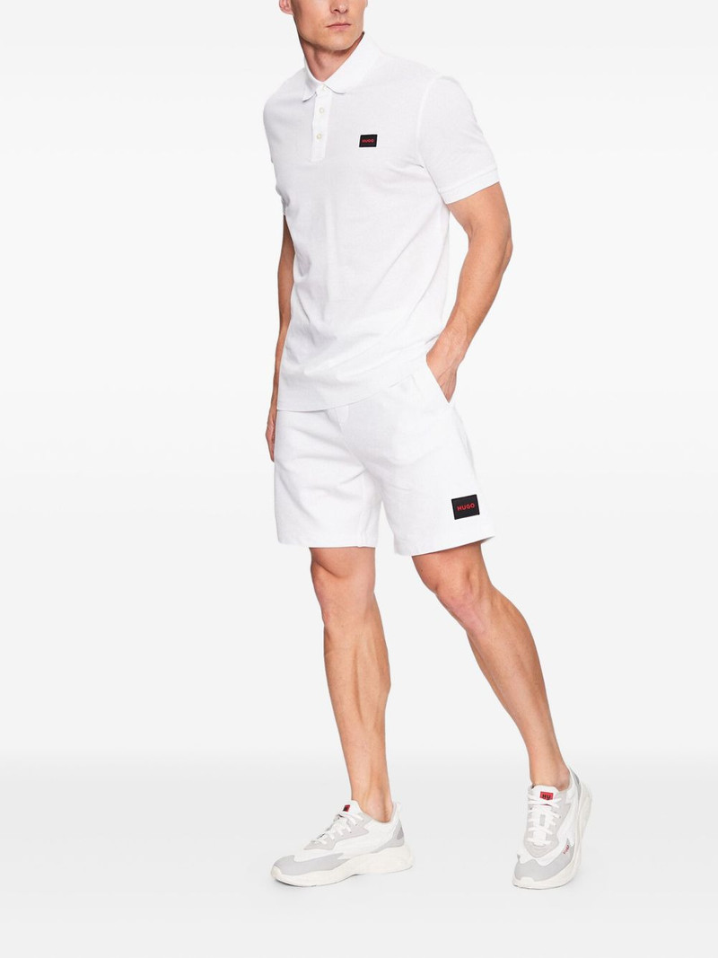 HUGO logo-patch drawstring swim shorts outlook