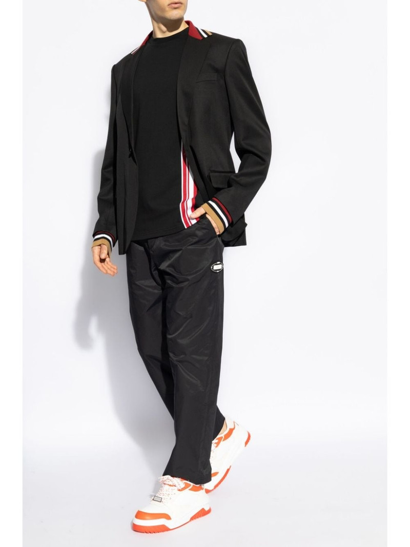 Moschino logo-patch track pants outlook