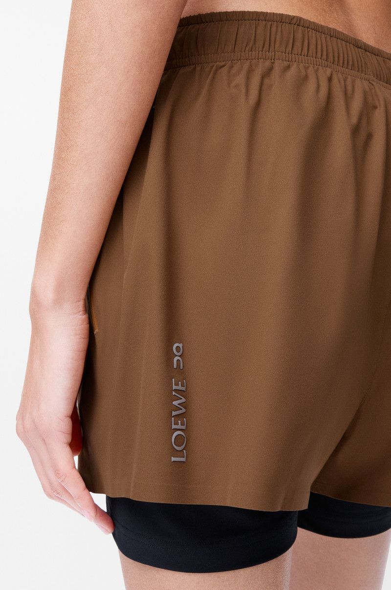 Performance shorts in technical shell 5