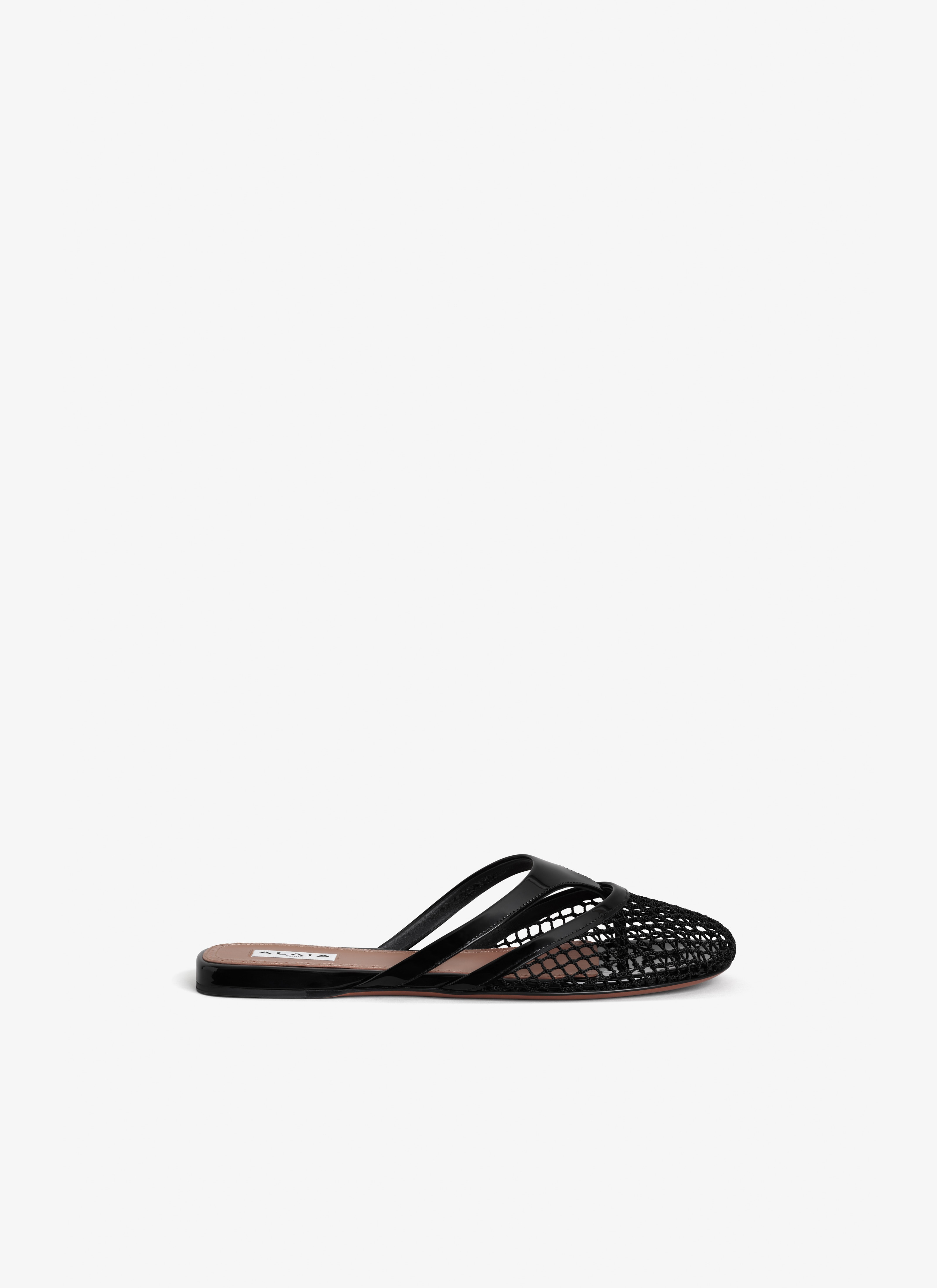サンダル・ミュール Alaia Flat Mule ALAÏA Patent-leather trimmed fishnet mules | NET-A-PORTER