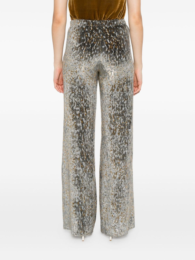 animal-patterned wide-leg trousers 4