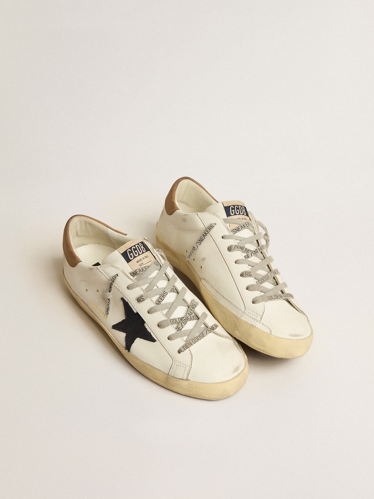 Super-Star with blue canvas star and tobacco leather heel tab