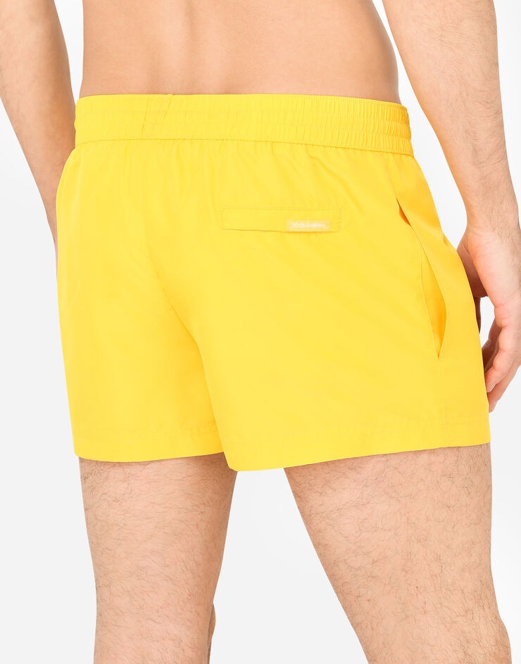 Short swim trunks with metal DG logo - 5