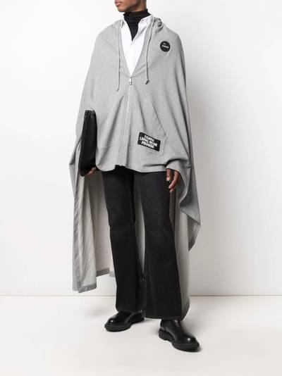 Raf Simons oversized asymmetric cape outlook