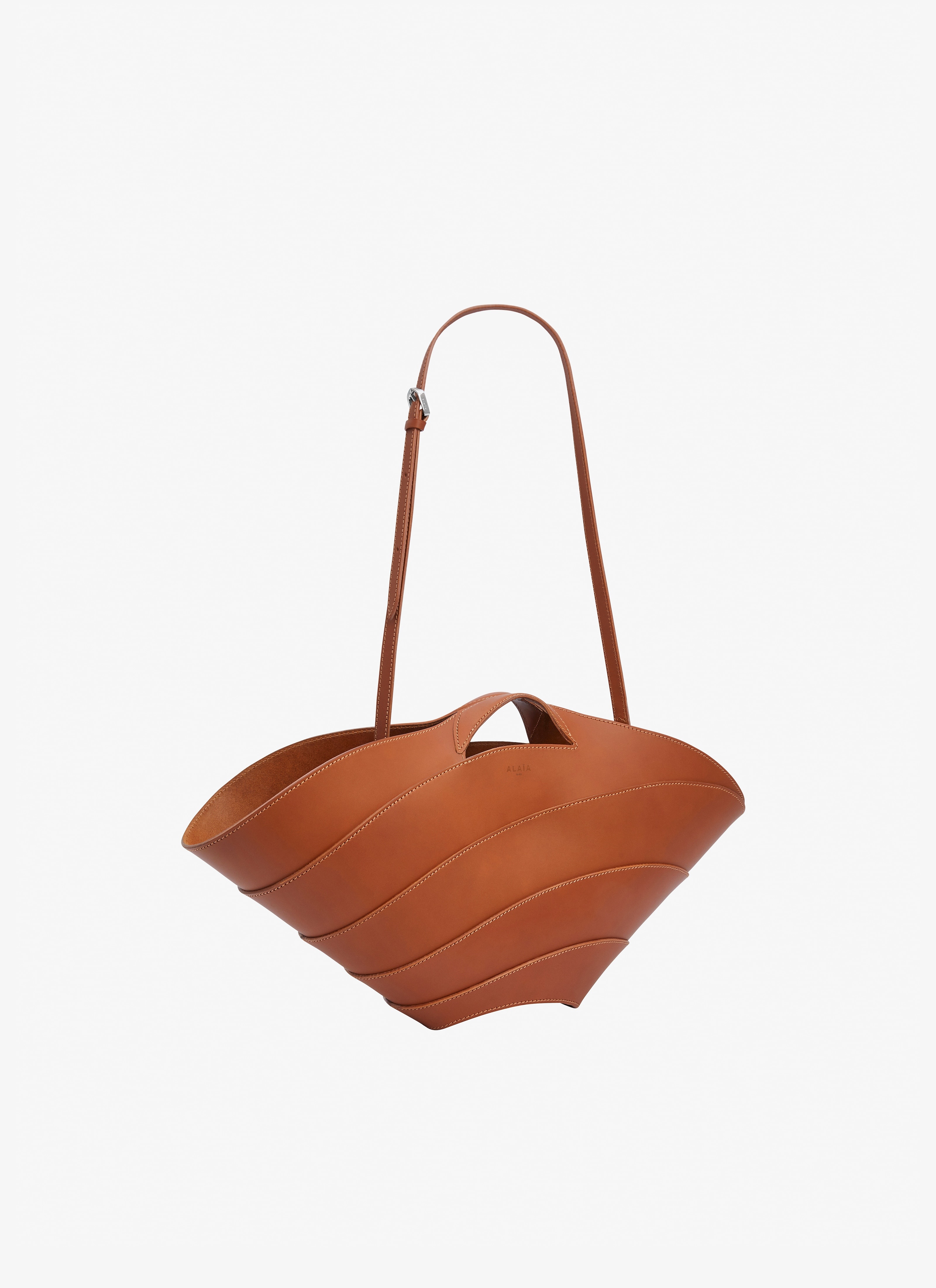 Alaïa Khaima Medium leather tote bag | mytheresa | REVERSIBLE