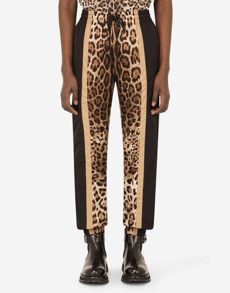 Jogging pants with leopard-print inserts - 1