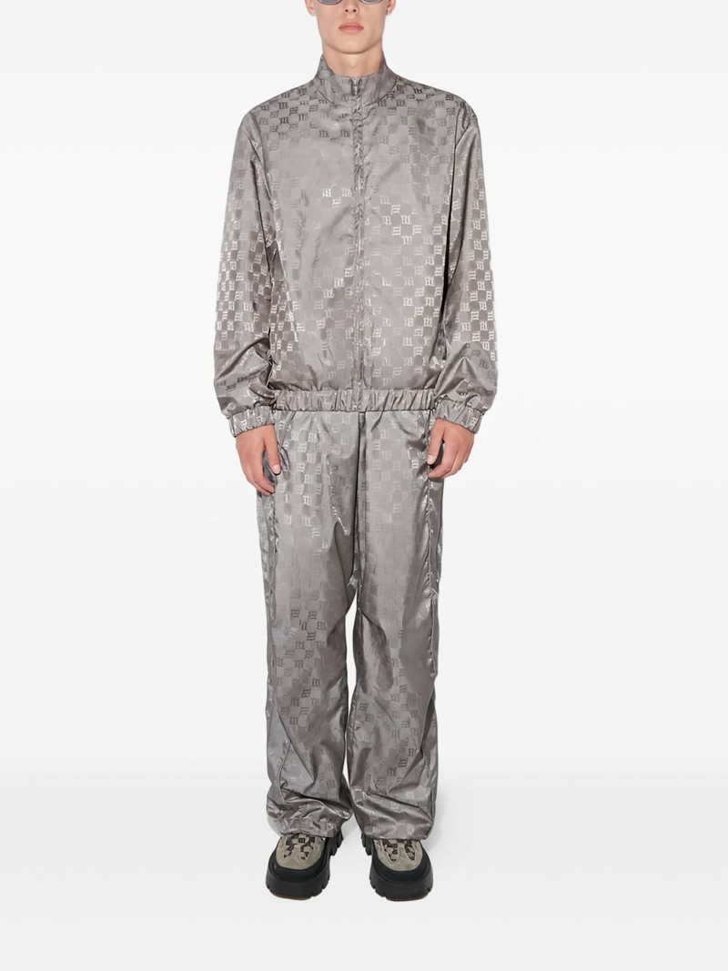 MISBHV monogram-patterned trousers outlook