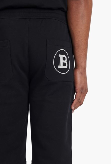 Black cotton shorts with white Balmain Paris logo print - 8