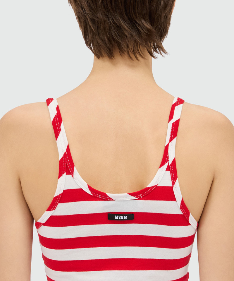 White and red striped jersey top. 3