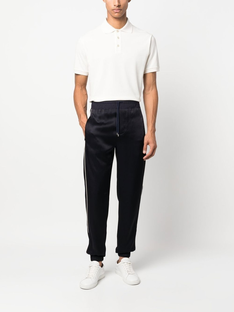 SAINT LAURENT glossy-finish track pants outlook