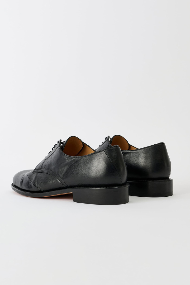 Patched Parade Malleable Black Bull Hide 6