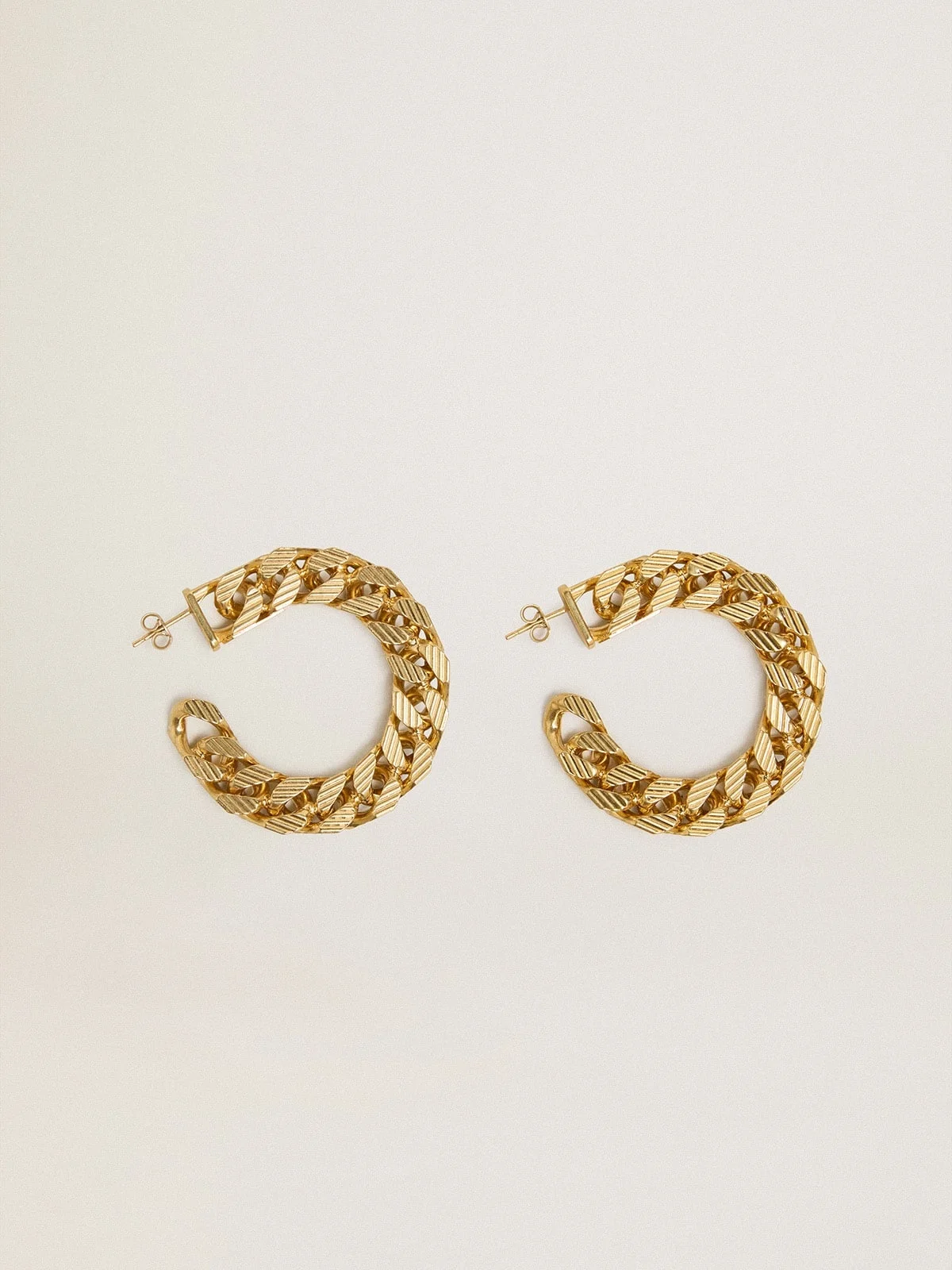 Chain hoop earrings with antique gold colored braided links - 1
