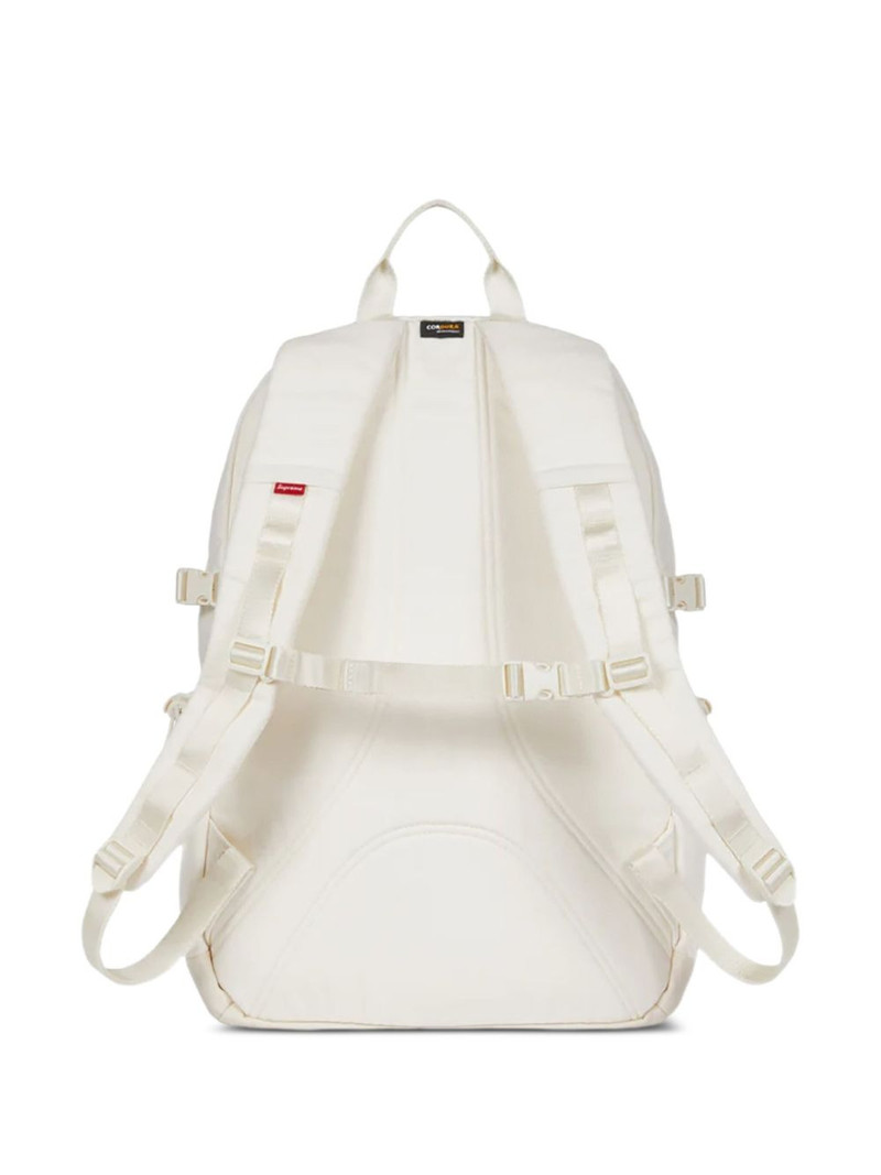 Supreme logo-plaque denim backpack outlook