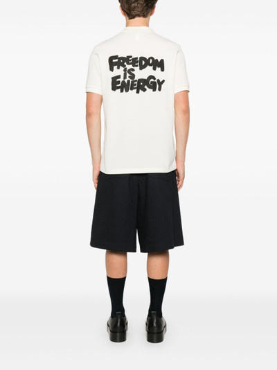 Comme des Garçons SHIRT x Fred Perry slogan-print polo shirt outlook