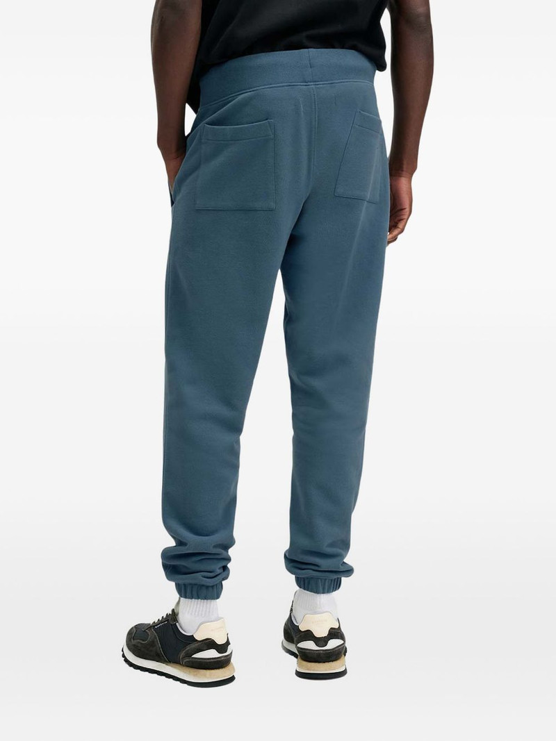 Raven logo-embroidered track pants 4