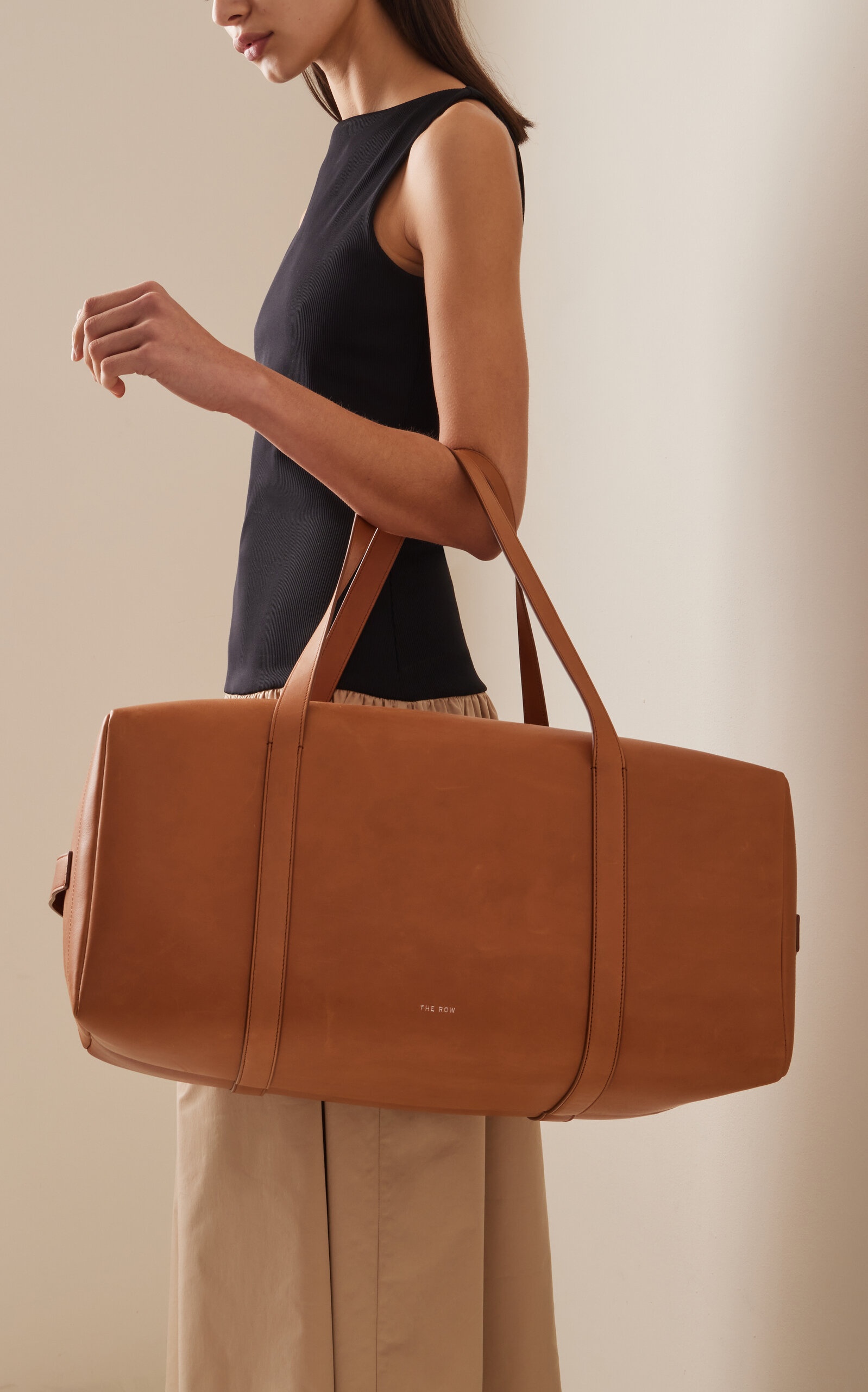 大人気 【THE ROW】 Gio leather duffel bag レザー製 ダッフル Gio leather duffel bag in brown - The Row | Mytheresa