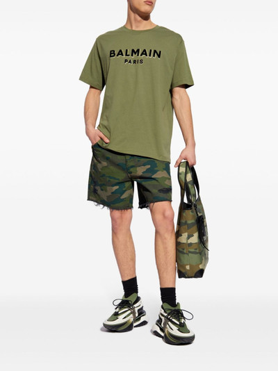 Balmain camouflage print distressed shorts outlook