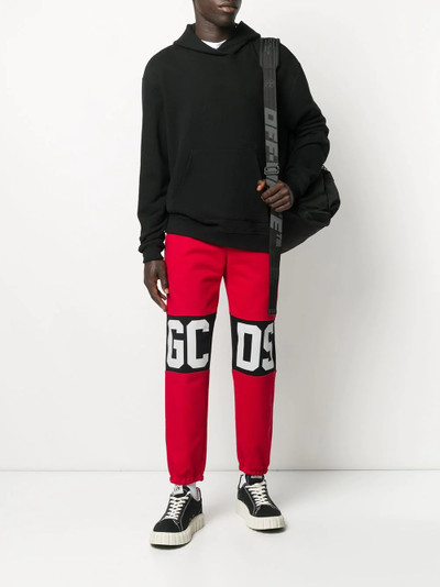 GCDS logo print track pants outlook