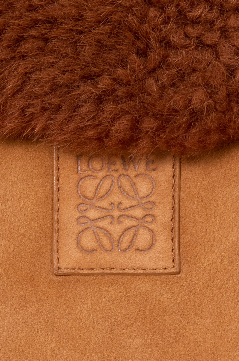 Coat in shearling 3